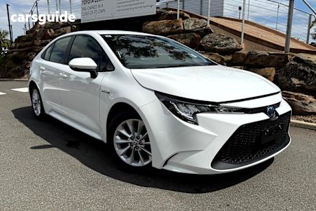 White 2022 Toyota Corolla Sedan ASCENT SPORT HYBRID F