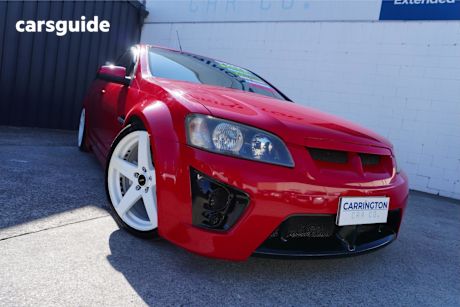 Red 2009 Holden Commodore Utility Omega