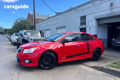 Red 2011 Holden Cruze Sedan Sri