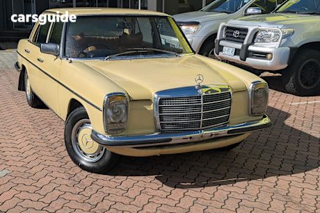 Yellow 1974 Mercedes-Benz 280E Sedan R