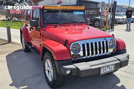 Red 2014 Jeep Wrangler Hardtop Unlimited Overland