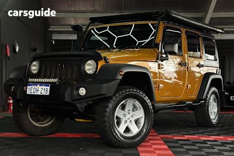 Gold 2014 Jeep Wrangler Sedan UNLIMITED SPORT 4X4