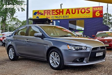 Grey 2014 Mitsubishi Lancer Sedan LS F