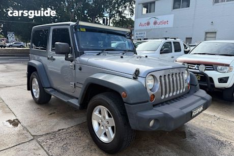 Silver 2013 Jeep Wrangler Softtop Sport (4X4)