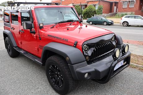 Red 2013 Jeep Wrangler Softtop Unlimited Sport (4X4)
