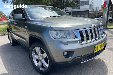 Gold 2012 Jeep Grand Cherokee Wagon Overland (4X4)