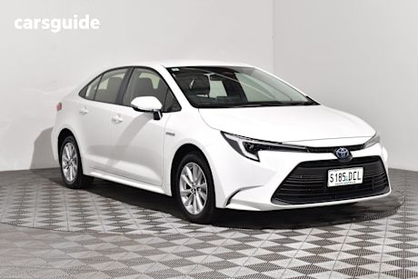 White 2024 Toyota Corolla Sedan ASCENT SPORT HYBRID F