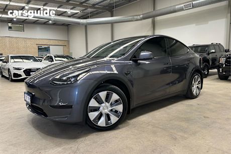 Silver 2022 Tesla Model Y SUV REAR-WHEEL DRIVE