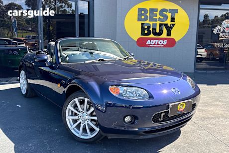 Purple 2006 Mazda MX-5 SUV ROADSTER COUPE R