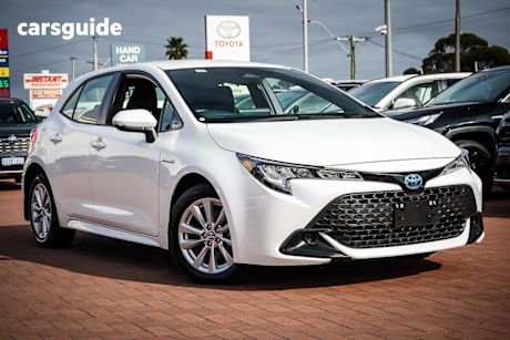 White 2024 Toyota Corolla Hatchback Ascent Sport + Conv Pk Hybrid