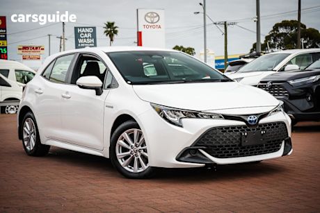 White 2024 Toyota Corolla Hatchback Ascent Sport + Conv Pk Hybrid