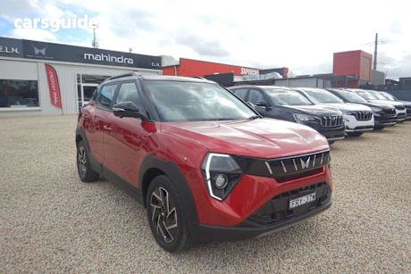 Red 2025 Mahindra XUV3XO SUV AX7L F