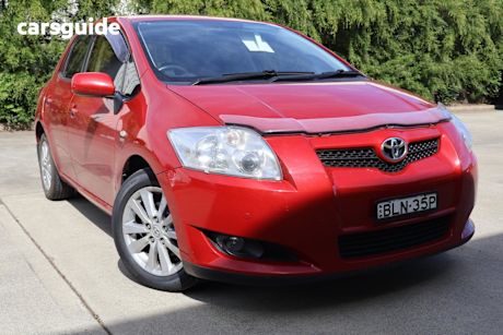 Red 2009 Toyota Corolla Hatchback Conquest