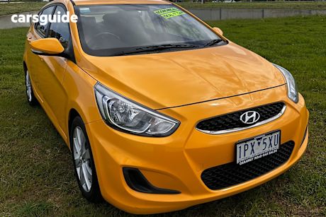 Yellow 2017 Hyundai Accent Hatchback Sport
