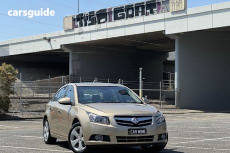 Gold 2009 Holden Cruze Sedan CDX F