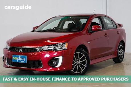 Red 2017 Mitsubishi Lancer Sedan Es Sport