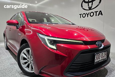 Red 2023 Toyota Corolla Sedan Ascent Sport Hybrid