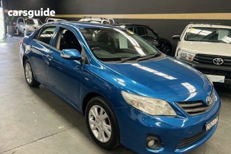 Blue 2012 Toyota Corolla Sedan Ascent Sport
