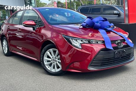 Red 2024 Toyota Corolla Sedan Ascent Sport