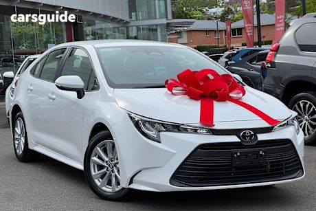 White 2024 Toyota Corolla Sedan Ascent Sport