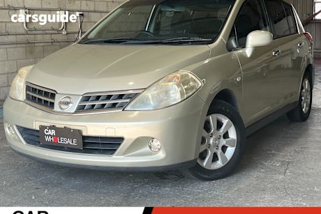 Beige 2011 Nissan Tiida Hatchback St