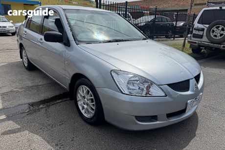 Silver 2004 Mitsubishi Lancer Sedan Es