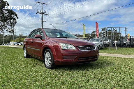 Red 2006 Ford Focus Sedan Cl