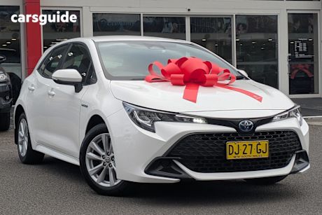 White 2023 Toyota Corolla Hatchback Ascent Sport Hybrid