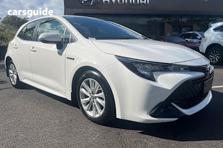 White 2023 Toyota Corolla Hatchback Ascent Sport Hybrid
