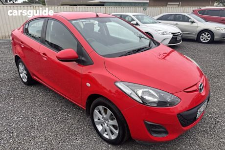 Red 2010 Mazda 2 Sedan Maxx