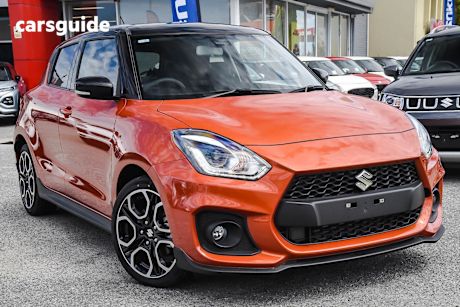 Orange 2025 Suzuki Swift Hatch