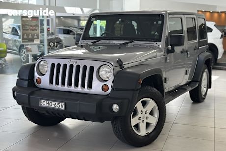 Silver 2013 Jeep Wrangler Softtop Unlimited Sport (4X4)