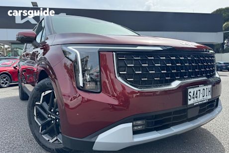 Red 2025 Kia Carnival Wagon Sport+