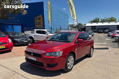 Red 2011 Mitsubishi Lancer Sedan Es
