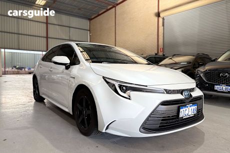 White 2023 Toyota Corolla Sedan Ascent Sport Hybrid