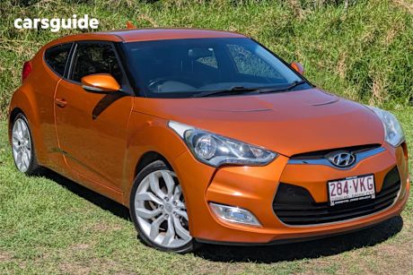 Orange 2014 Hyundai Veloster Coupe