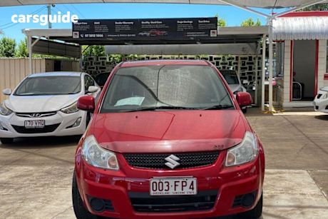 Red 2009 Suzuki SX4 Hatch