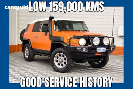 Orange 2013 Toyota FJ Cruiser Wagon