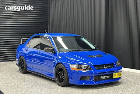 Blue 2001 Mitsubishi Lancer Sedan EVOLUTION VII RS-II