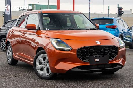 Orange 2024 Suzuki Swift Hatchback Hybrid Plus