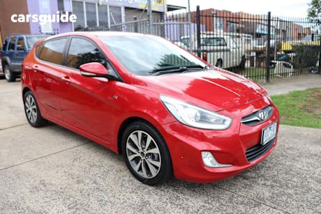 Red 2014 Hyundai Accent Hatchback Sr
