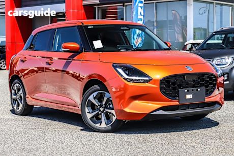 Orange 2025 Suzuki Swift Hatch