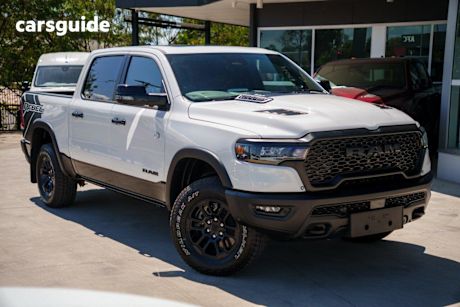 White 2025 Ram 1500 Crew Cab Utility Rebel Hurricane