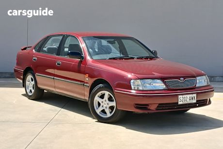 Red 2001 Toyota Avalon Sedan Conquest