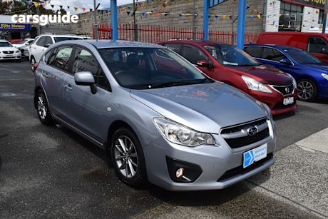 Silver 2014 Subaru Forester Wagon 2.5I