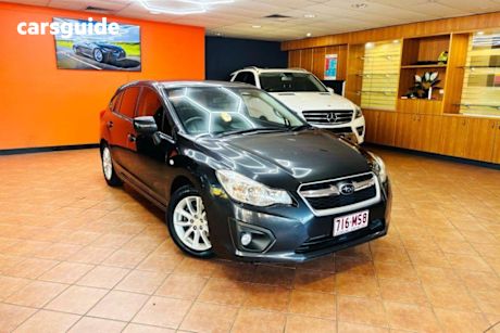 Black 2012 Subaru Impreza Hatchback 2.0I-L (Awd)