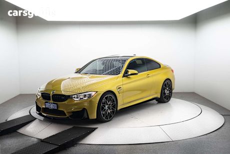 Yellow 2014 BMW M4 Coupe
