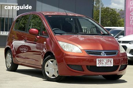 Red 2005 Mitsubishi Colt Hatchback Ls