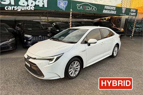 White 2024 Toyota Corolla Sedan Ascent Sport Hybrid