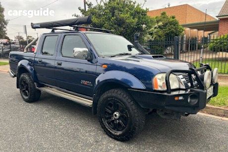 Blue 2009 Nissan Navara Dual Cab Pick-up St-R (4X4)